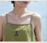 ノラ・スパークス 刺繍トップス